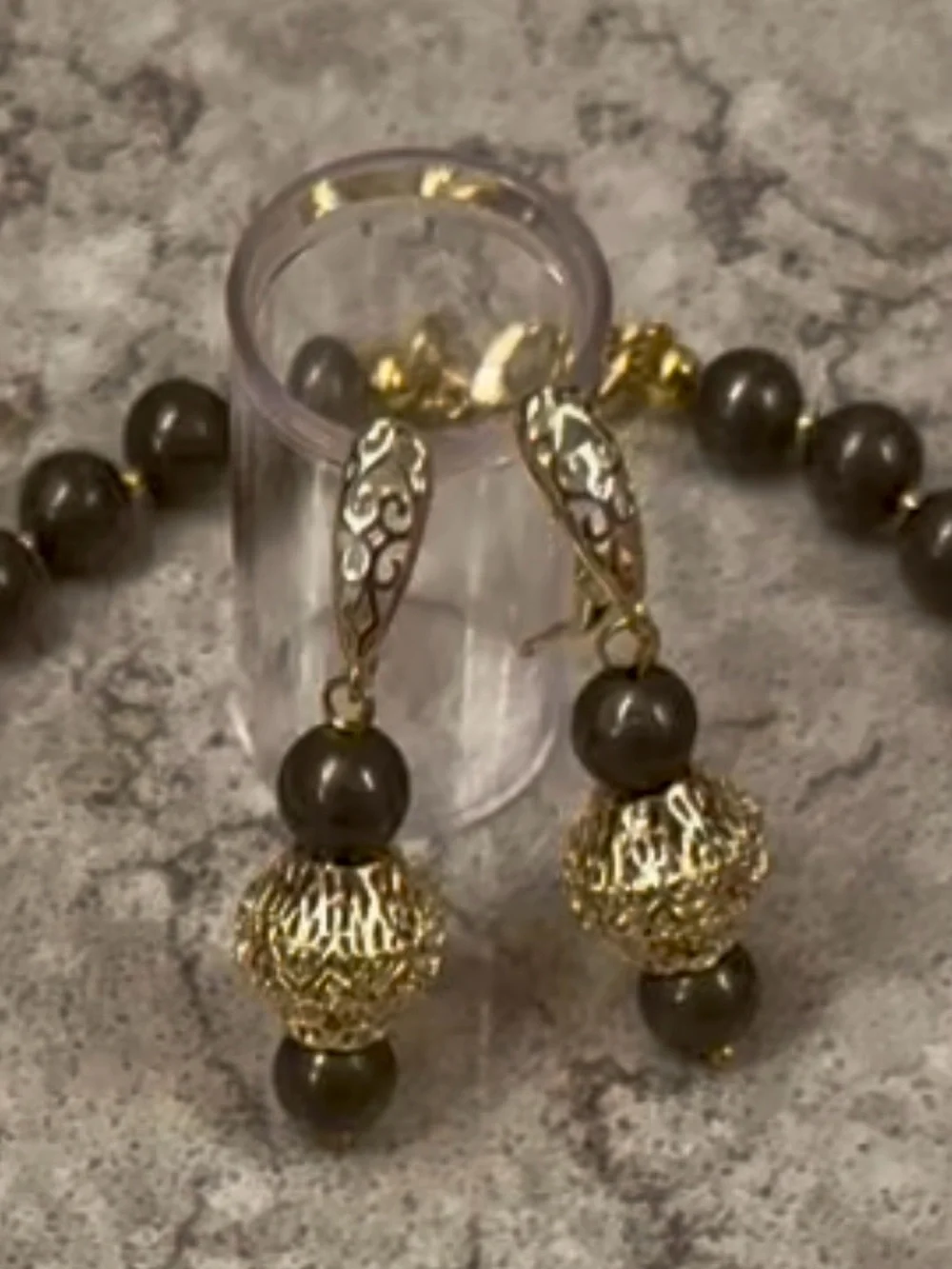 Large silver tone coin in gold tone setting on pyrite necklace with earrings